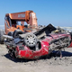 Illustration for article titled Assholes Brag About Crushing A Honda Prelude Buried On A Beach By Hurricane Harvey (Update)
